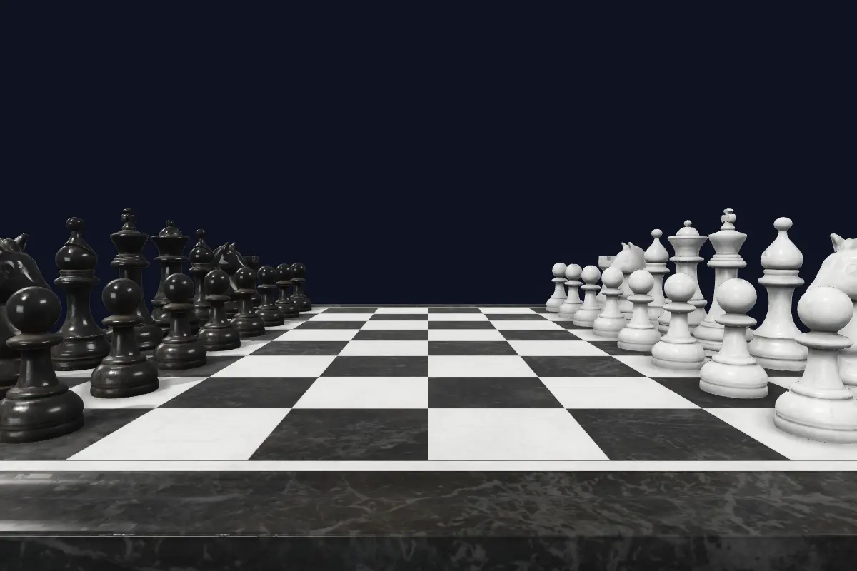 Close-up of marble chess pieces with soft studio reflections