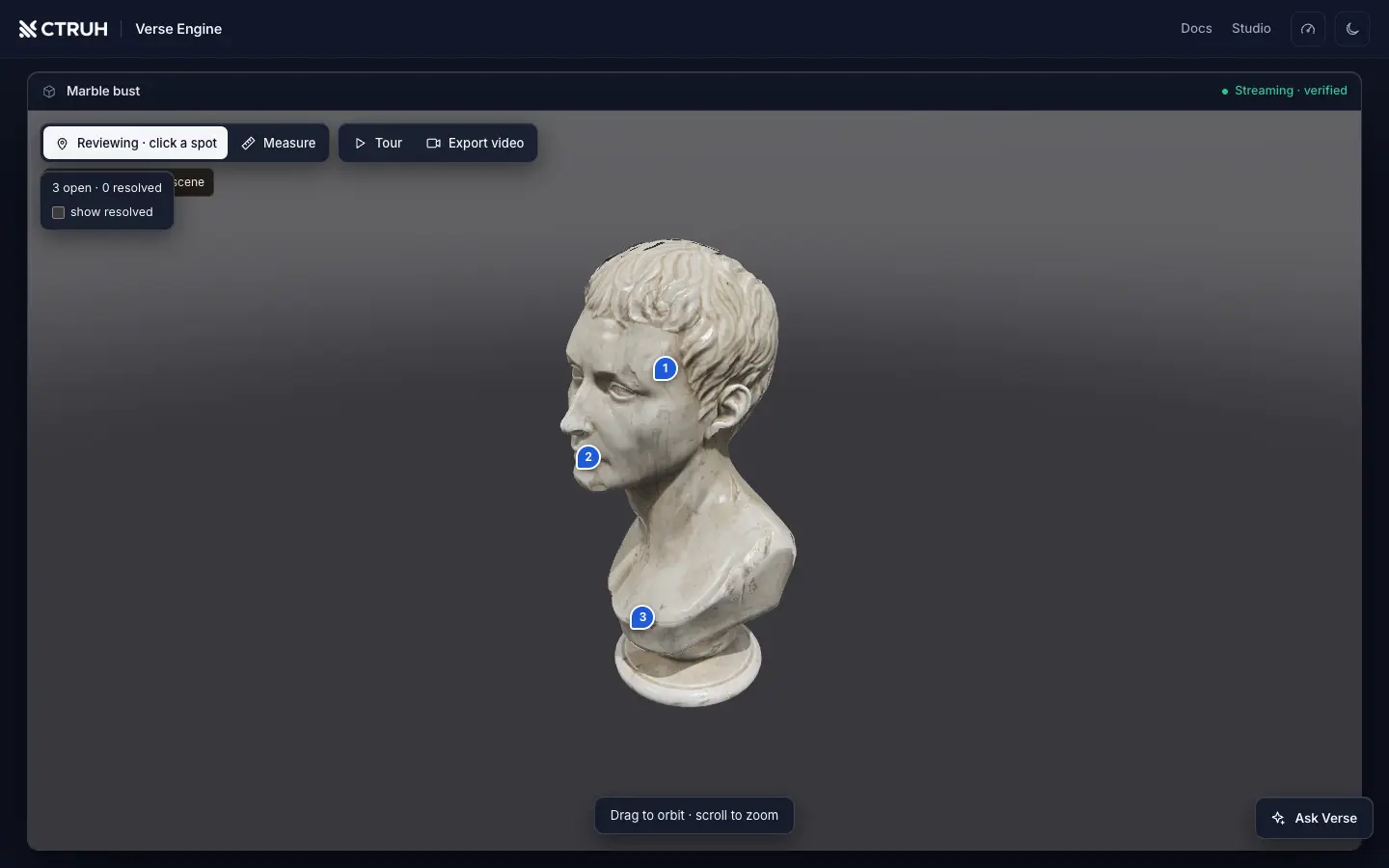 Three numbered review pins placed on a marble bust